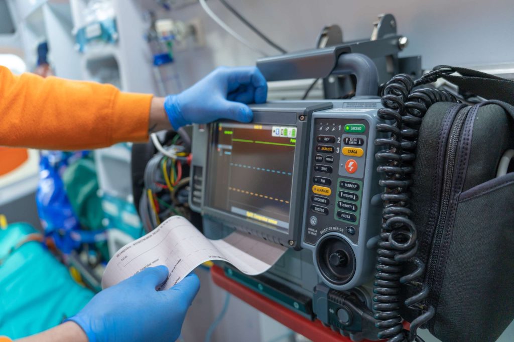 photo of a defibrillator monitor printing an